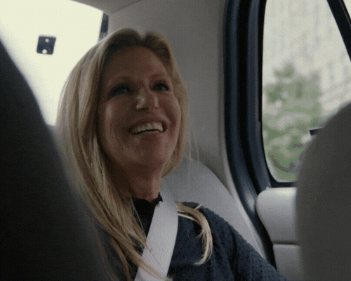 Happy women being collected in a rental vehicle using Kendall Cars Meet and Greet service.