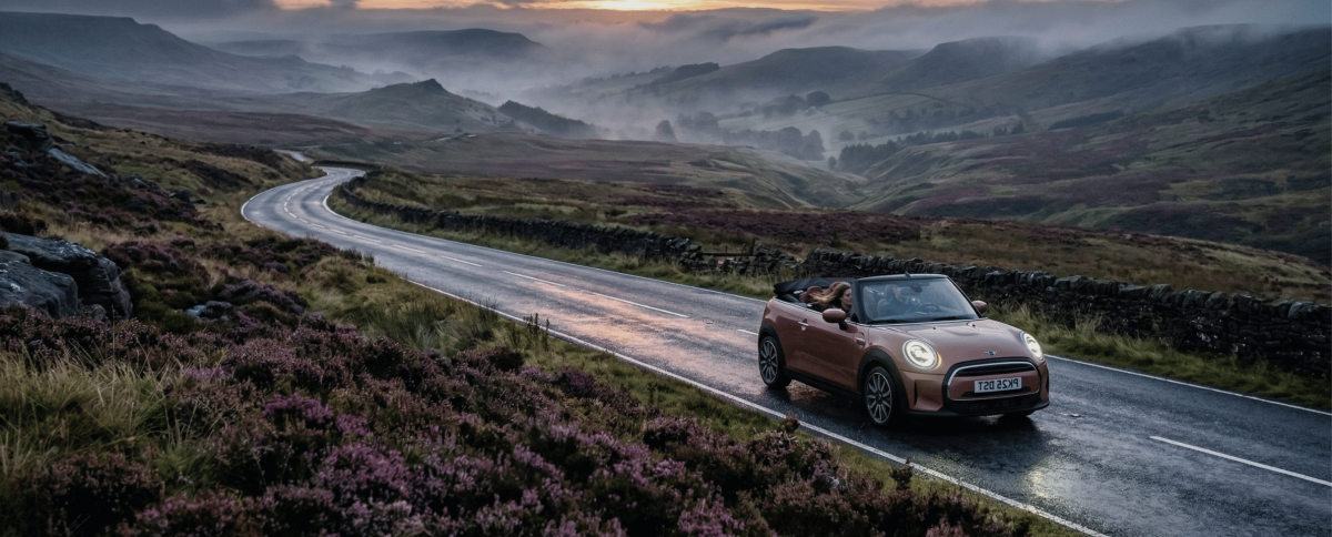 BMW MINI Convertible on countryside road &mdash; Easter car hire Kendall Cars